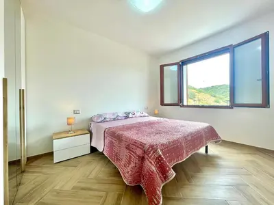 Letto o letti in una camera di Le Corti Sarde On The Hill