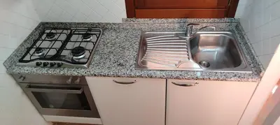 Cucina o angolo cottura di Villa Malugi Oasi Esclusiva a Costa Rei