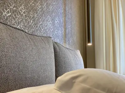 Letto o letti in una camera di Le Due Torri ROOMS