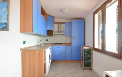 Cucina o angolo cottura di Lovely Apartment In Ilbono With Wifi