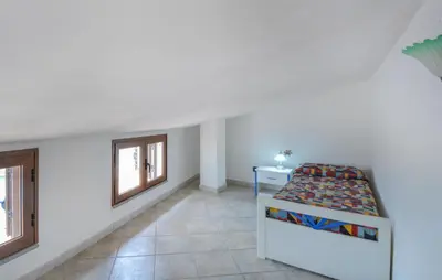 Letto o letti in una camera di Lovely Apartment In Ilbono With Wifi