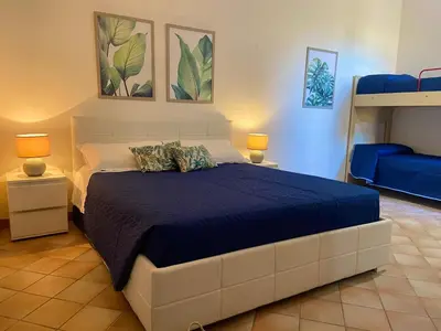 Letto o letti in una camera di Casa Vacanza Violet 2