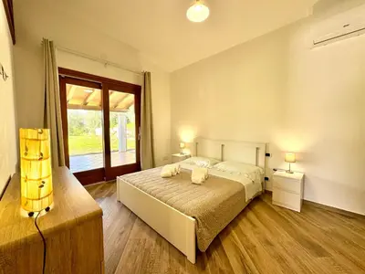 Letto o letti in una camera di Cronta Apartments