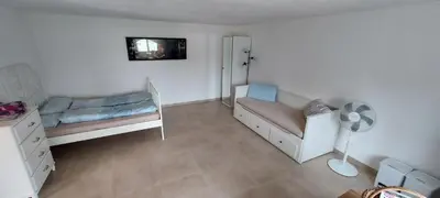 Letto o letti in una camera di Piuma Studio