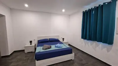 Letto o letti in una camera di Gli Ulivi