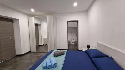 Letto o letti in una camera di Gli Ulivi