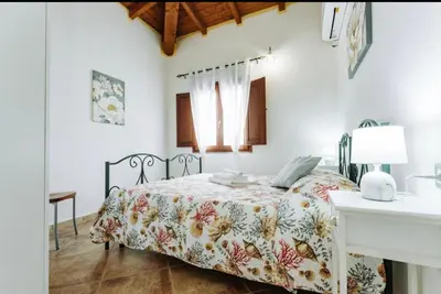 Letto o letti in una camera di Villetta Gio