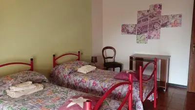 Letto o letti in una camera di Da Martina
