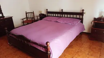 Letto o letti in una camera di Da Martina