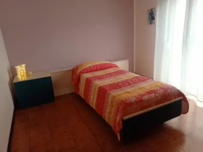 Letto o letti in una camera di Da Martina