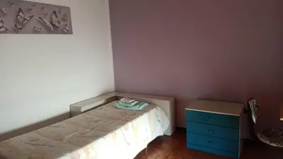 Letto o letti in una camera di Da Martina