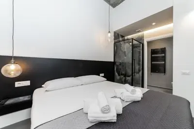 Letto o letti in una camera di Poettos heART - Rooms
