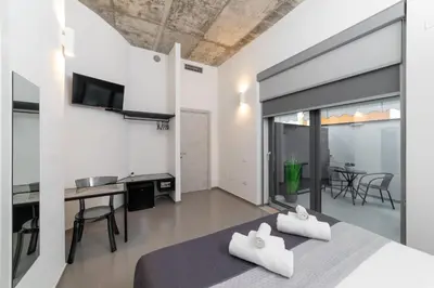 Letto o letti in una camera di Poettos heART - Rooms