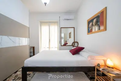 Letto o letti in una camera di Malaika Home by Propertize
