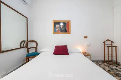 Letto o letti in una camera di Malaika Home by Propertize