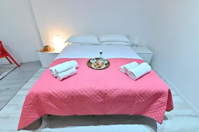 Letto o letti in una camera di IzzHome The Breeze
