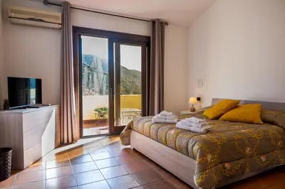 Letto o letti in una camera di Villa Barbara
