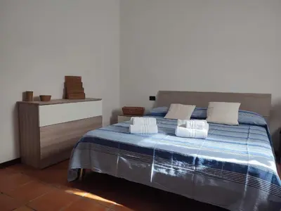 Letto o letti in una camera di Villa Barbara