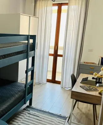 Letto o letti in una camera di Modern Blue Apartment