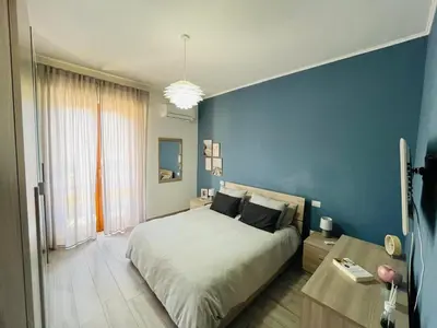 Letto o letti in una camera di Modern Blue Apartment