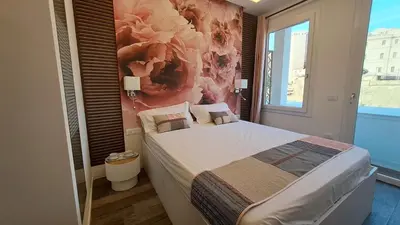 Letto o letti in una camera di Centro Panoramic