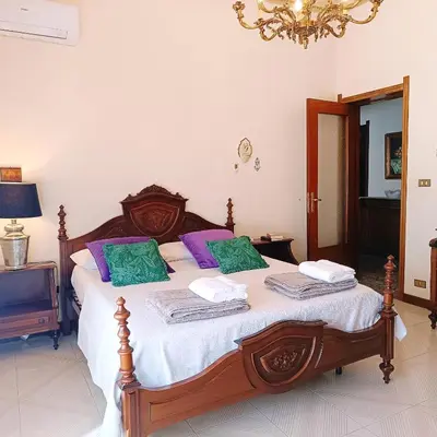 Letto o letti in una camera di Casa vacanze in villa