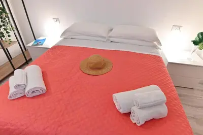 Letto o letti in una camera di IzzHome City Heart Rooms