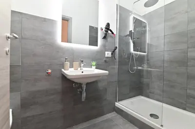 Bagno di IzzHome City Heart Rooms