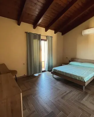 Letto o letti in una camera di Baistroccu