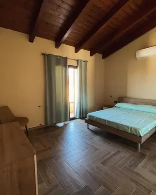 Letto o letti in una camera di Baistroccu