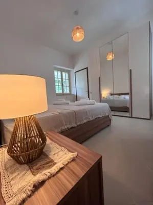 Letto o letti in una camera di Lantana's house