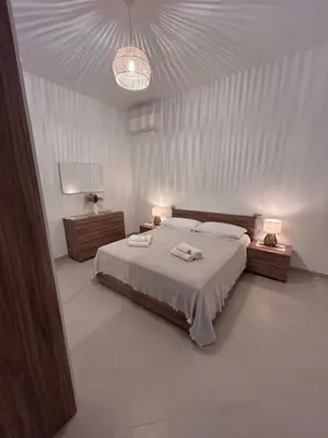 Letto o letti in una camera di Lantana's house