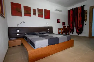 Letto o letti in una camera di Villa Gallo - Piano terra