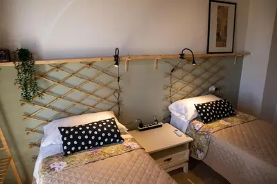 Letto o letti in una camera di Yellow House