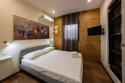 Letto o letti in una camera di Admiral Appartment