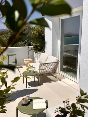 Area soggiorno di Vireo Rooms