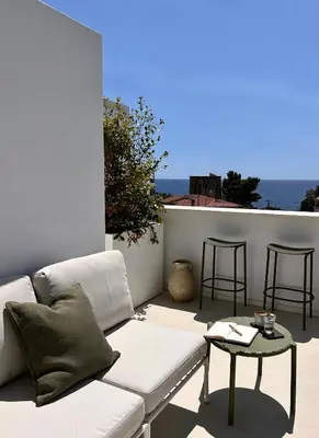 Area soggiorno di Vireo Rooms