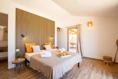 Letto o letti in una camera di Villa MAJU