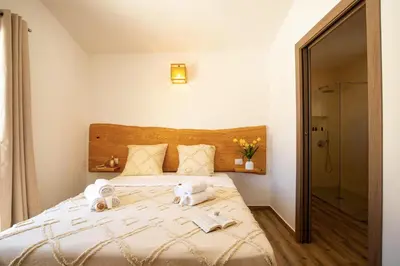 Letto o letti in una camera di Villa MAJU