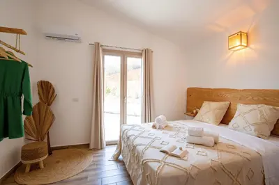 Letto o letti in una camera di Villa MAJU