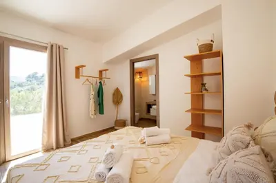 Letto o letti in una camera di Villa MAJU