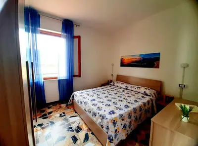 Letto o letti in una camera di Casa dell'olmo