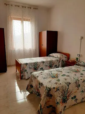 Letto o letti in una camera di Casa dell'olmo