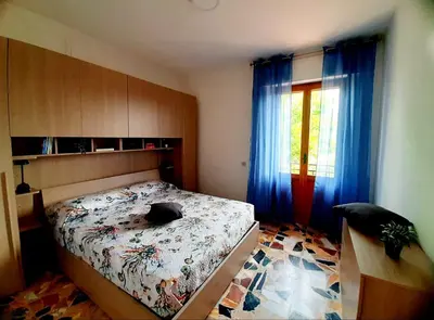 Letto o letti in una camera di Casa dell'olmo