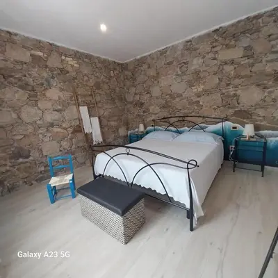 Letto o letti in una camera di S'Arrollieddu