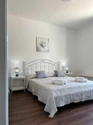 Letto o letti in una camera di Harmony Affittacamere
