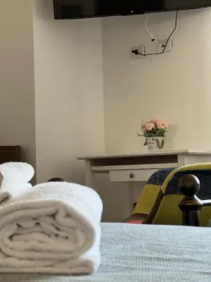 Letto o letti in una camera di Harmony Affittacamere