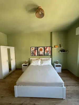 Letto o letti in una camera di The Green Room