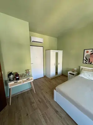 Letto o letti in una camera di The Green Room