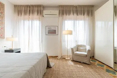Letto o letti in una camera di Scarlatti Family Nest